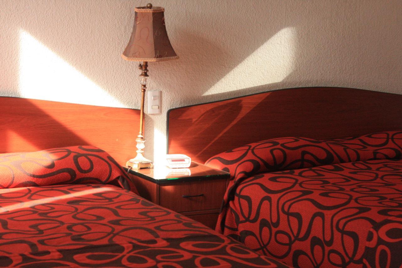 Habitación con 2 camas grandes